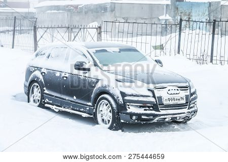 Novyy Urengoy, Russia - December 22, 2018: Frozen Motor Car Audi Q7 In The City Street During A Heav
