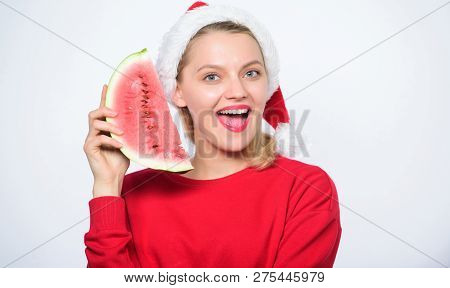 Woman Santa Hat Hold Slice Watermelon. Prolong Summer. Travel Christmas Vacation And Holidays Resort
