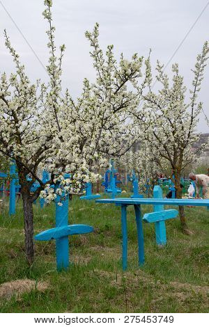 Tocuz, Moldova- 16 April, 2018: People In The Cemetery Celebrating The Dead During Memorial Easter