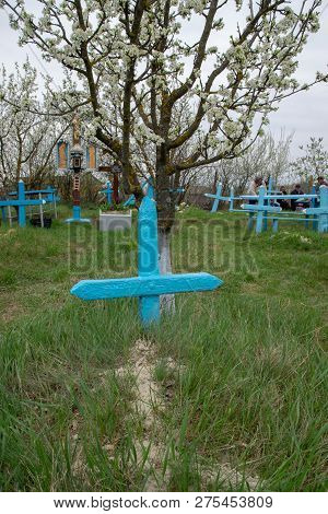 Tocuz, Moldova- 16 April, 2018: People In The Cemetery Celebrating The Dead During Memorial Easter