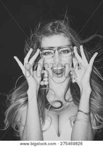 Sexy Girl With Makeup And Big Earrings, Dark Background. Optics Store Concept. Girl Short Sightednes