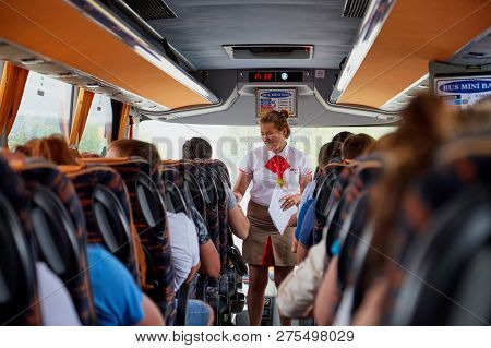 Marmaris, Turkey - May 26, 2018: Female Guide In The Bus With Tourists. People During Travel. Transf