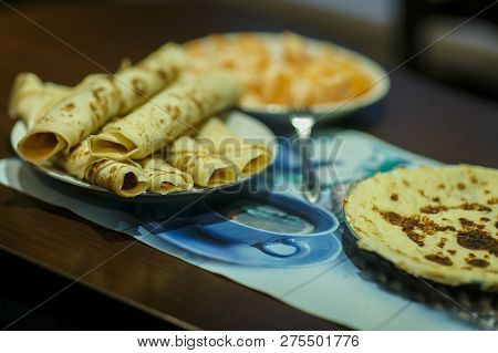 Pancakes With Strawberries, Nuts And Maple Syrup
