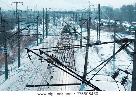 Rail Cars Loaded With The Wood Being Transported From Nearby Mines To Power Plants In Winter