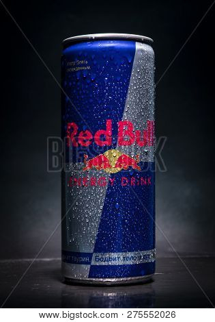 Sankt-petersburg, Russia - December 25, 2018: Aluminum Can Of Redbull Drink With Water Drops Over Da