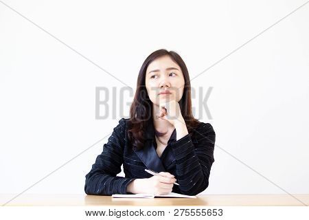 Asian Business Women Age Between 25-30 Years Old In The Black Suit In Action Close Up On White Backg