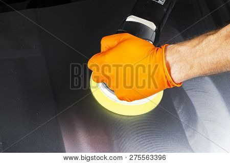 Car Polish Wax Worker Hands Applying Protective Tape Before Polishing. Buffing And Polishing Car. Ca