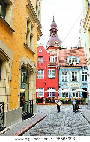 Riga, Latvia - Augustl 28, 2018: View From Kramu Street To The Old Buildings With One Of The Oldest 