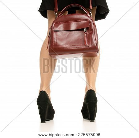 Woman Legs Feet Black Dress Shoes Red Purse Bag On White Baclground Isolation