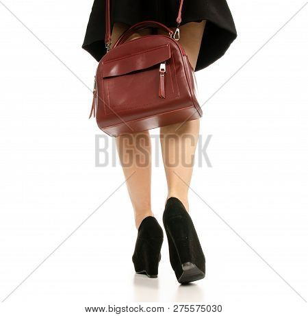 Woman Legs Feet Black Dress Shoes Red Purse Bag On White Baclground Isolation