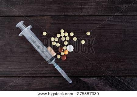 A Needle, A Syringe And Other Drugs Will Make You A Little Happier.