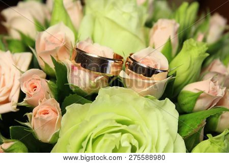 Bridal Bouquet, Small Delicate Roses. Spring Bouquet Of Roses. Flowers For The Bride. Wedding Rings 