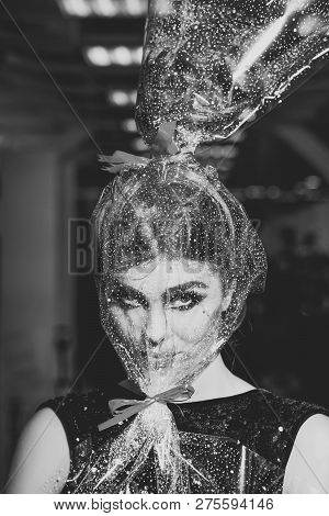 Woman Face Makeup Wrapped In Overwrap, Pack. Girl With Transparent Wrapper On Face, Present. Beauty,