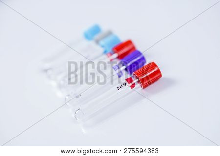 Six Bottles For Samples Used In Hospitals Or Medicine For Blood Samples In A Laboratory On White Bac
