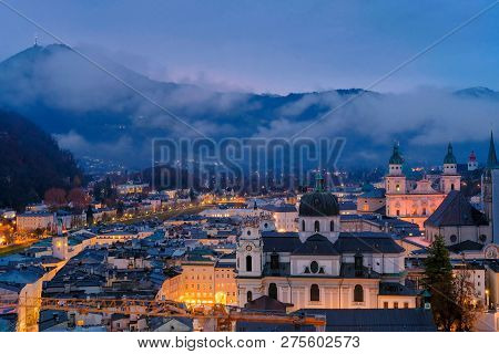 Salzburg Morning Cityscape With Main Cathedral, Kollegienkirche And Illuminated Streets Of Old Town 