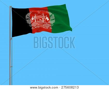 Isolate Flag Of Islamic Republic Afghanistan On A Flagpole Fluttering In The Wind On A Blue Backgrou