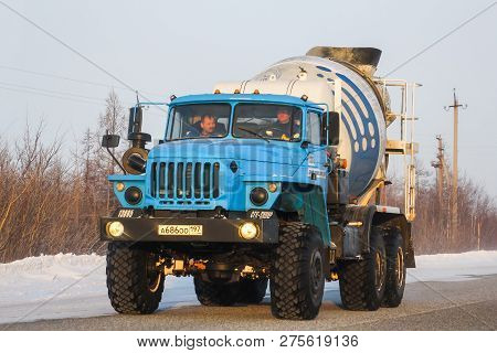 Novyy Urengoy, Russia - March 23, 2013: Concrete Mixer Truck Ural 4320 At The Interurban Road.