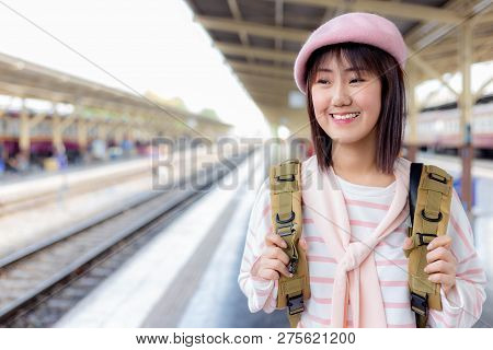 Attractive Beautiful Woman Stand At Train Station And Going To Some Place By Train. Lovely Woman Lov