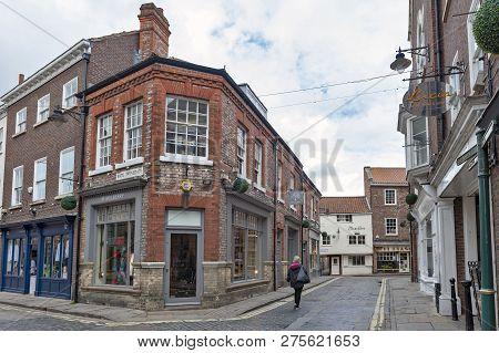York, England - April 2018: Old Brick Building At Corner Of Swinegate Street In Historic District Of