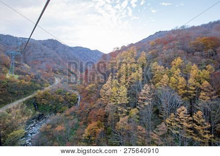 Tanigawadake Mountain Or Mount Tanigawa  With Vibrant Autumn Foliage In Minakami, Japan