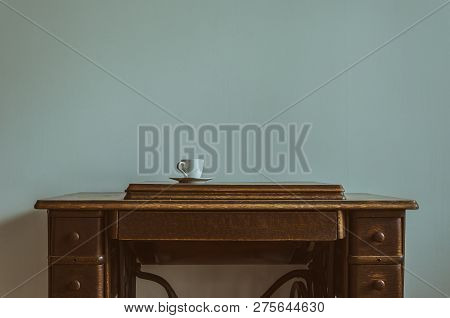 Sewing Machine - A Cup On An Old Home Appliance