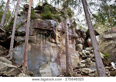 Dovbush Rocks In Green Forest At Carpathian Mountains.