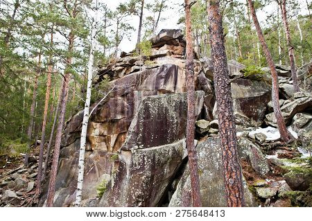 Dovbush Rocks In Green Forest At Carpathian Mountains.