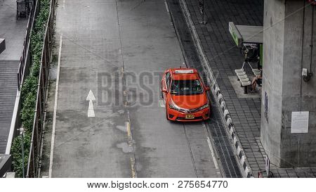 Bangkok, Thailand - Sep 16, 2018. A Red Taxi On Street In Bangkok, Thailand. All Taxis In Bangkok Ar