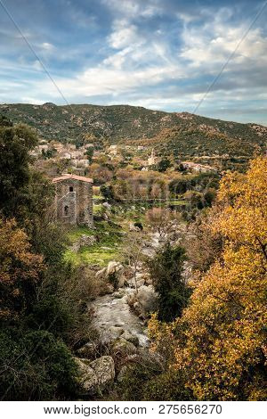 Ancient Mountain Village Of Feliceto In The Balagne Region Of Corsica Surrounded By Autumnal Trees