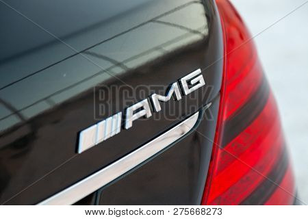 Novosibirsk, Russia - 08.01.2018: Reflective Sunlight Taillight Red With Metal Chrome Emblem On A Bl