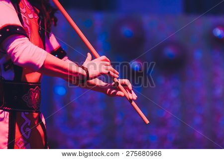 Man In National Costume Play National Music Instrument. Kurai.