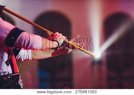Man In National Costume Play National Music Instrument. Kurai.