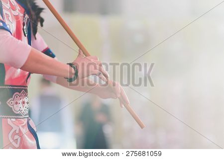 Man In National Costume Play National Music Instrument. Kurai.