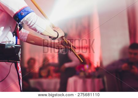 Man In National Costume Play National Music Instrument. Kurai.