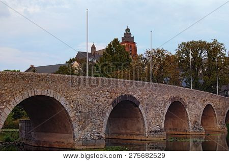 Close-up Photo Of Old Lanh Bridge In Wetzlar. City Park And The Wetzlar Cathedral At The Background.