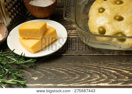 Cooking Focaccia Italian Bread With Olives, Butter, Cheese And Rosemary Greens. Chef's Homemade Reci
