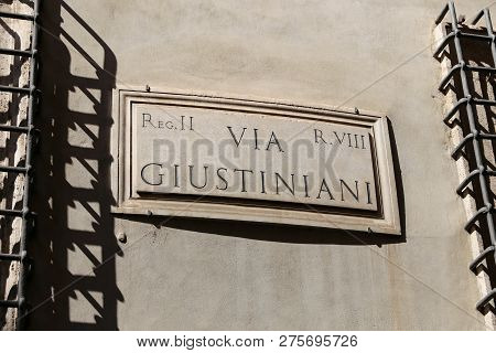 Via Giustiniani Street Sign In Rome, Italy