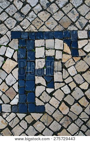Portuguese Sidewalk Of Calcada In The Form Of The Letter F