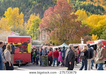 Arrowtown, New Zealand - April 2018: Tourists Flock To Arrowtown For The Akura Arrowtown Autumn Fest