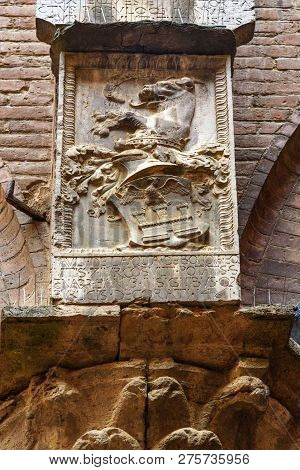 Siena, Italy - October 02, 2018: Oat Of Arms On Wall In Courtyard Of Courtyard Of Palazzo Pubblico I