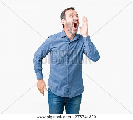 Handsome middle age elegant senior man over isolated background shouting and screaming loud to side with hand on mouth. Communication concept.
