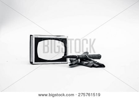 Close Up Of Mini Cigar Or Mini Cigarette Or Bidi Or Beedi Isolated On White With A Matchbox.