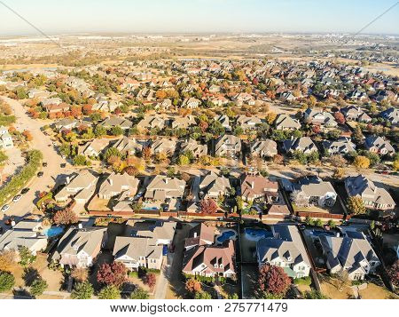 Top View New Development Residential Neighborhood And Urban Sprawl At Morning Fall Light