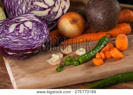 Verious Fresh Vegetables On A Wooden Table, Healthy Food