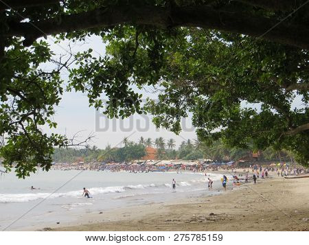 Anyer, Indonesia - June 24, 2018: Many People Doing Activities At Sambolo Beach.