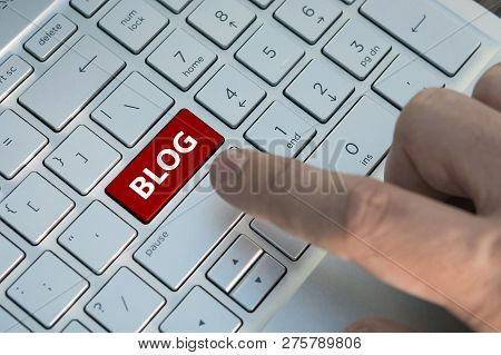 Computer Keyboard With Text Blog. Blogger Presses A Color Button On A Gray Silver Keyboard Of A Mode