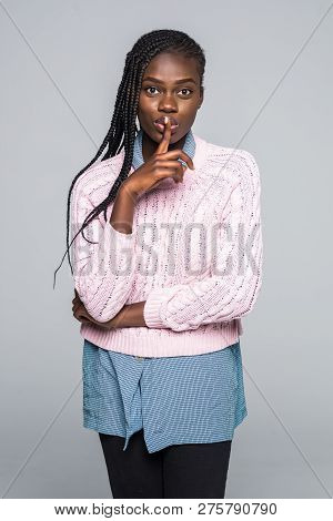 Closeup Portrait Of Mysterious Charming Woman Asking For Keeping Sil Ence Holding Forefinger On Plum