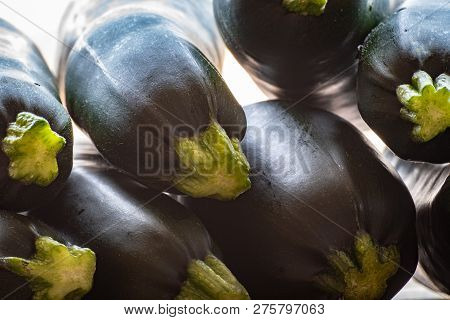 Close Up On A Fresh Crop Of Raw Green Zucchini Vegetables, Summer Squash.