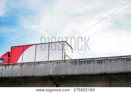 White Trucks Driving On The Bridge At Sunset Background.business Logistics Concept.global Business C