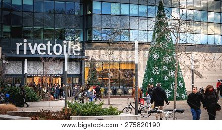 Strasbourg, France - December 28, 2017 - People Walking In Front Of Rivetoile Shopping Center Decora